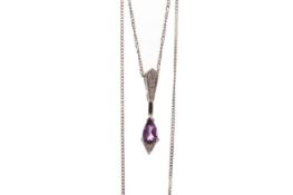 AN AMETHYST AND DIAMOND PENDANT