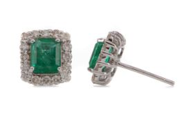 A PAIR OF EMERALD AND DIAMOND EARRINGS