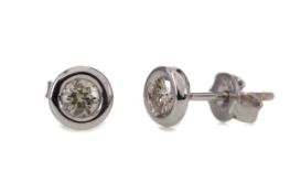 A PAIR OF DIAMOND STUD EARRINGS