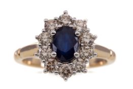 A SAPPHIRE AND DIAMOND RING