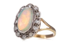 A LARGE OPAL AND DIAMOND CLUSTER RING