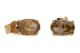 A PAIR OF CERTIFICATED FANCY YELLOW DIAMOND EARRINGS