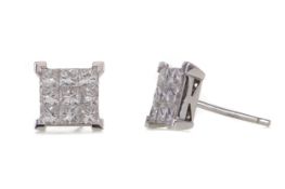 A PAIR OF DIAMOND STUD EARRINGS