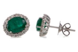 A PAIR OF EMERALD AND DIAMOND EARRINGS