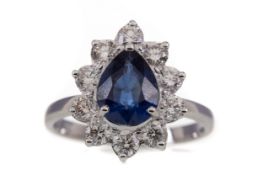 A SAPPHIRE AND DIAMOND RING