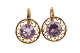 A PAIR OF AMETHYST SCREWBACK EARRINGS