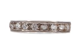 A PARTIAL WHITE GEM SET ETERNITY RING