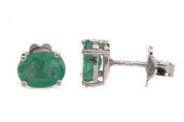 A PAIR OF EMERALD STUD EARRINGS