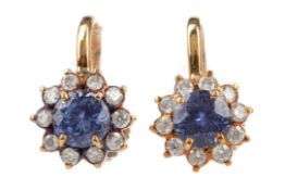 A PAIR OF TANZANITE CLUSTER EARRINGS