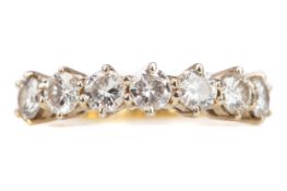 A DIAMOND SEVEN STONE RING