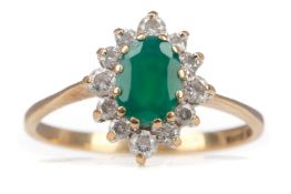 AN EMERALD AND GEM SET RING