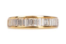 A YELLOW GOLD DIAMOND HALF ETERNITY RING