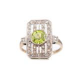 A PERIDOT AND DIAMOND RING