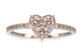 A DIAMOND HEART MOTIF RING