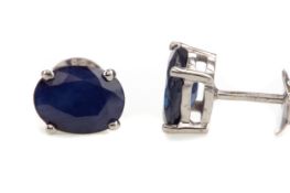 A PAIR OF TREATED SAPPHIRE STUD EARRINGS