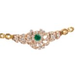 AN EMERALD AND DIAMOND BRACELET