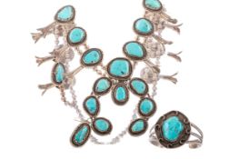 AN IMPORTANT HANDMADE NAVAJO INDIAN SQUASH BLOSSOM TURQUOISE NECKLACE ALONG WITH EARRINGS AND A CUFF