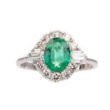 A CERTIFICATED EMERALD AND DIAMOND RING