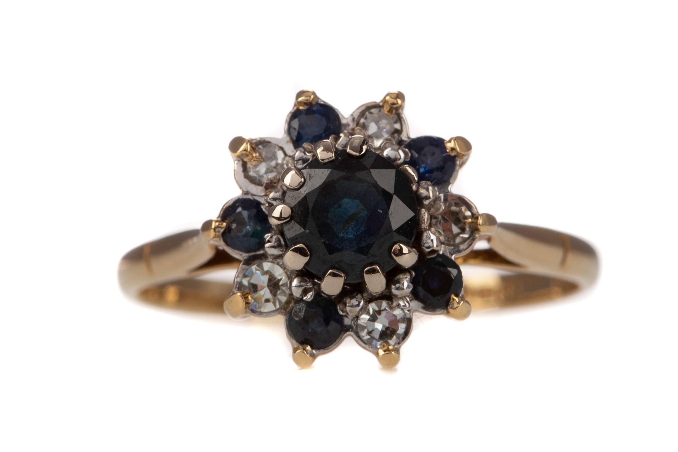 A SAPPHIRE AND DIAMOND RING