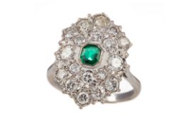 AN EMERALD AND DIAMOND RING