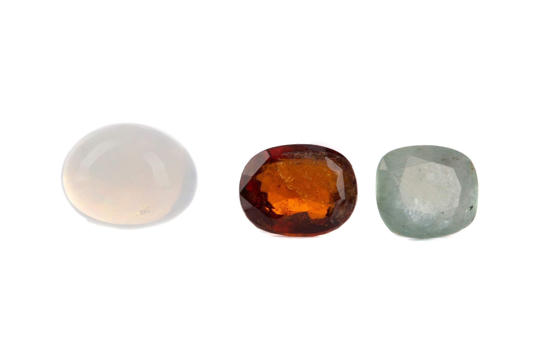 **THREE CERTIFICATED UNMOUNTED GEMSTONES