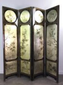 A CHINESE BLACK LACQUERED DRESSING SCREEN