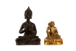 A SMALL BRONZE BUDDHA