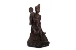 A CHINESE BRONZE FIGURE