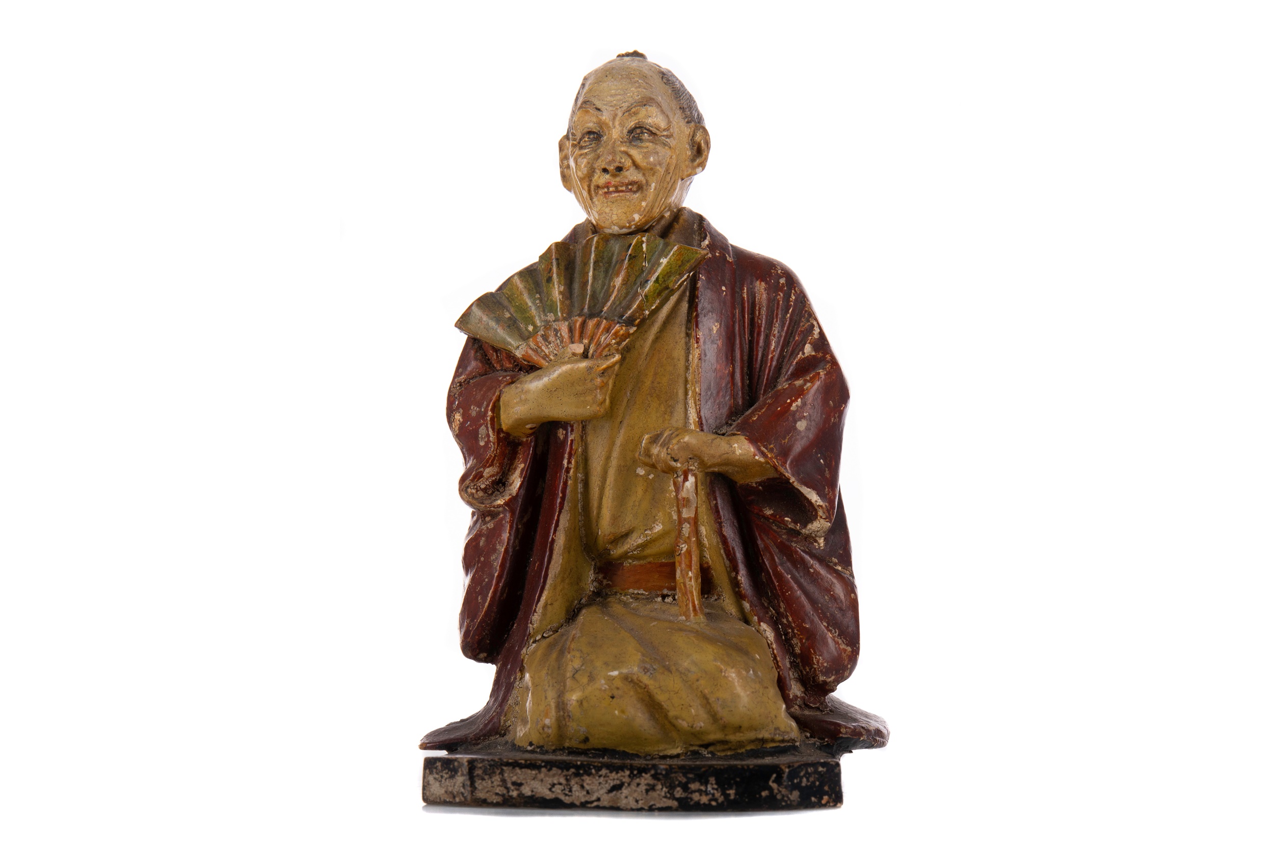 A CHINESE NODDING HEAD FIGURE