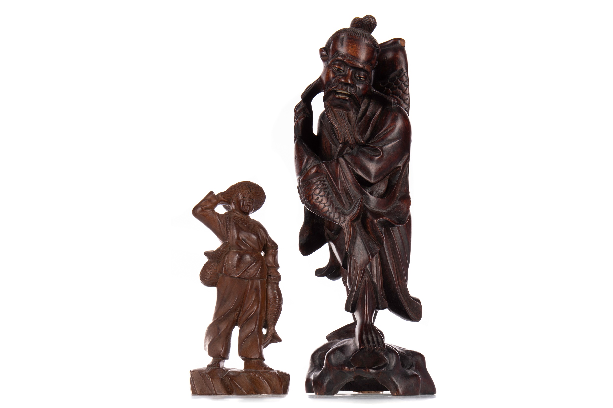 A CHINESE CARVED WOOD FIGURE OF A FISHERMAN