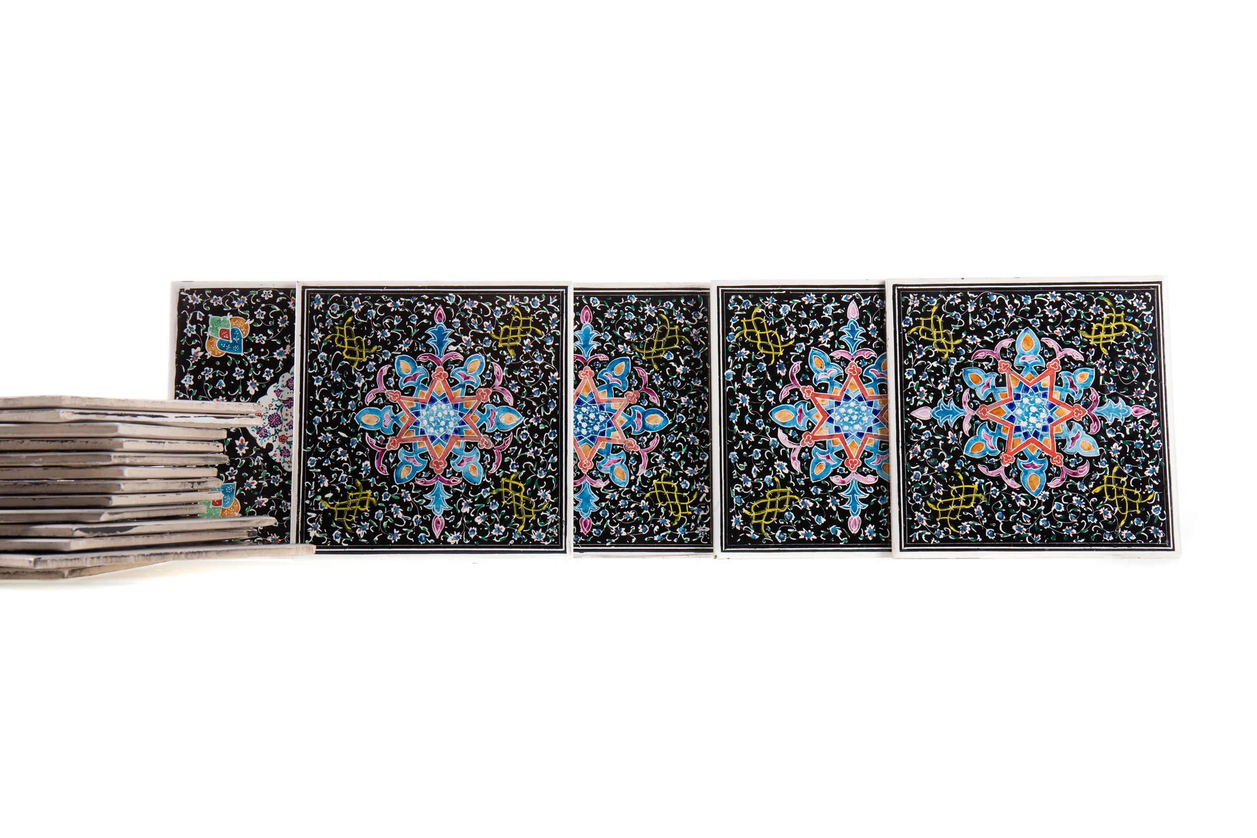 A SET OF EIGHTEEN PERSIAN CERAMIC TILES