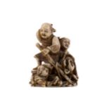 A JAPANESE IVORY NETSUKE