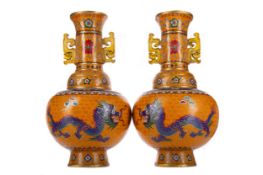 A LARGE PAIR OF CHINESE CLOISONNE ENAMEL DRAGON & PHOENIX VASES