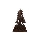 AN EASTERN BRONZE FIGURE OF TARA