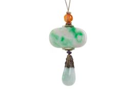 A SINO-TIBETAN WHITE AND GREEN JADE PENDANT