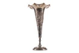 AN INDIAN WHITE METAL TRUMPET VASE