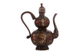 A CHINESE BRONZE EWER