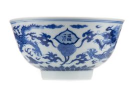 A CHINESE BLUE AND WHITE 'DRAGON' BOWL