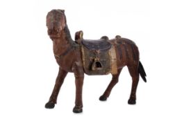 A CHINESE PAINTED CAPARISONED WOODEN HORSE