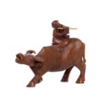 A CHINESE ROSEWOOD BOY ON WATER BUFFALO CARVING WITH A BUFFALO CALF