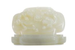 A 20TH CENTURY CHINESE CARVED JADE LOBED INK BOX