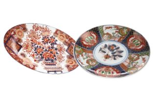 A 20TH CENTURY JAPANESE IMARI CIRCULAR PLAQUE AND ANOTHER