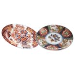 A 20TH CENTURY JAPANESE IMARI CIRCULAR PLAQUE AND ANOTHER