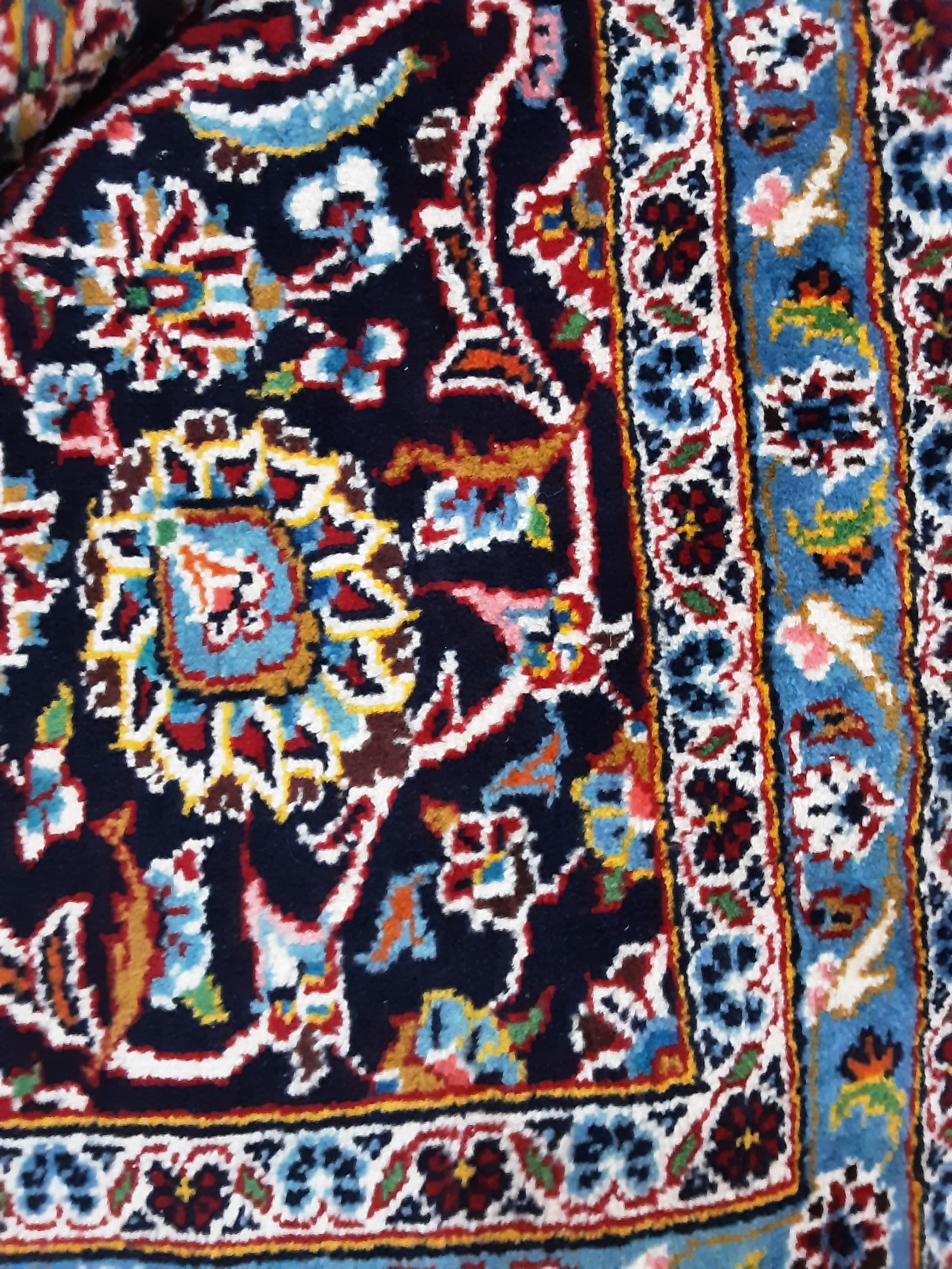 A LARGE PERSIAN KASHAN RUG