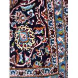 A LARGE PERSIAN KASHAN RUG