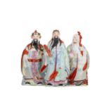 THREE CHINESE FAMILLE ROSE IMMORTAL FIGURES