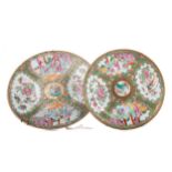 TWO CHINESE CANTON FAMILLE ROSE CIRCULAR PLAQUES