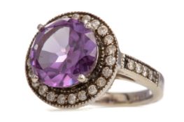 A PURPLE SAPPHIRE AND DIAMOND RING