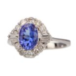 A TANZANITE AND DIAMOND RING