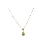 A PERIDOT AND DIAMOND NECKLACE